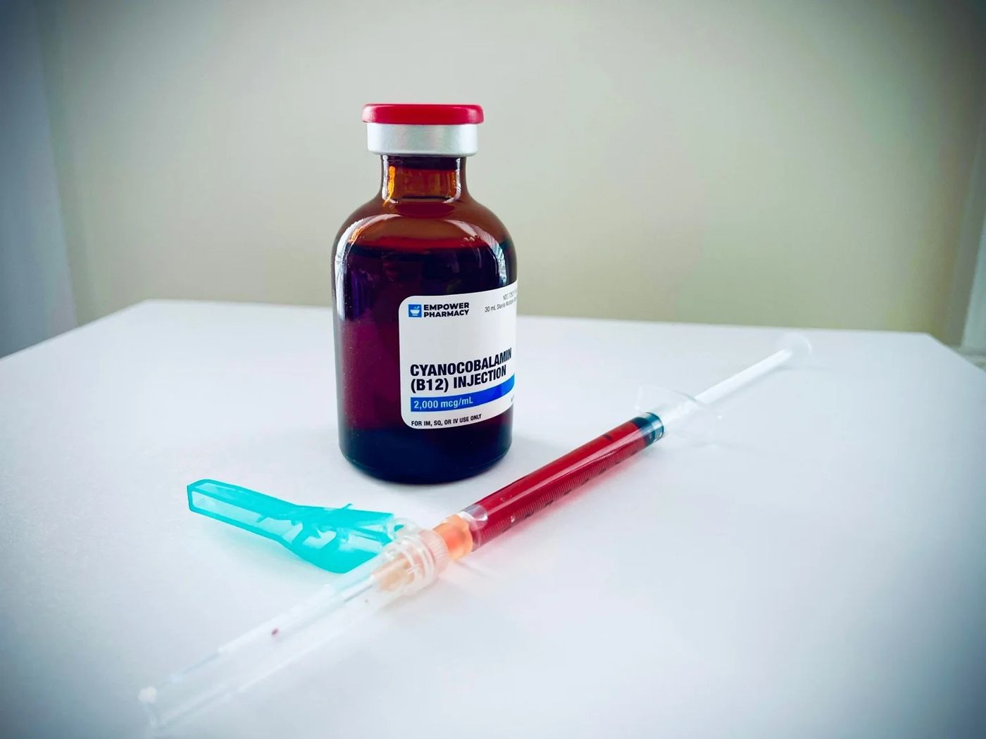 Vial and IV catheter on a table